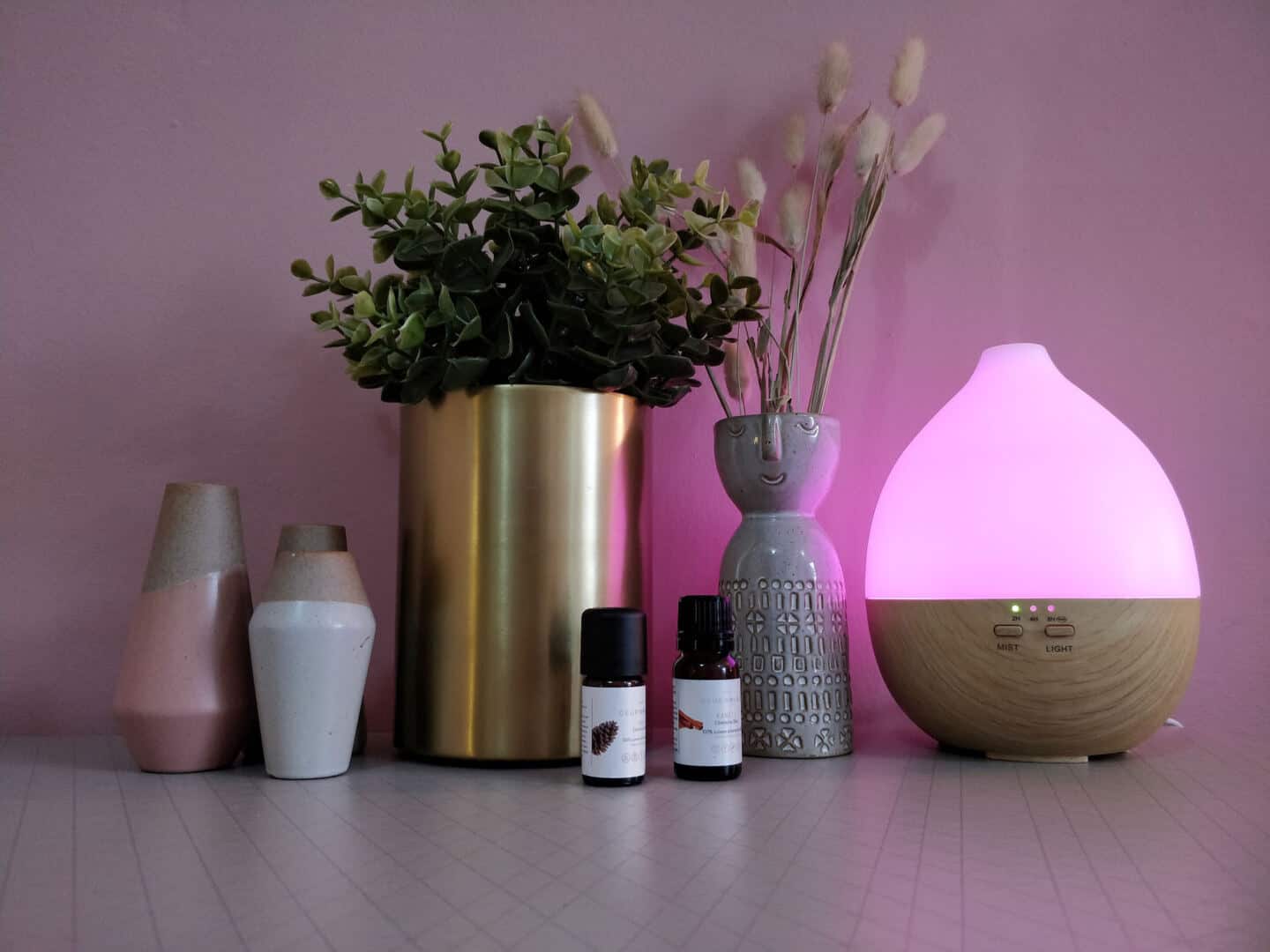 Smellacloud aroma diffuser with the pink LED light illuminated