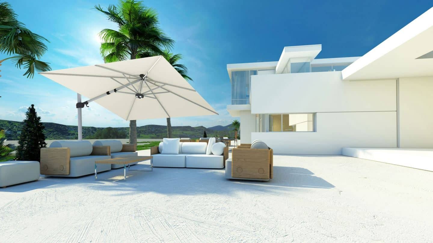 Garden Parasol from Solero Parasols.  Large white square parasol angled above outdoor sofas 