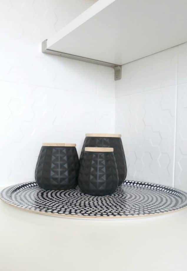 The Design Sheppard Kitchen Makeover featuring geometric patterned black storage jars from Mia Fleur