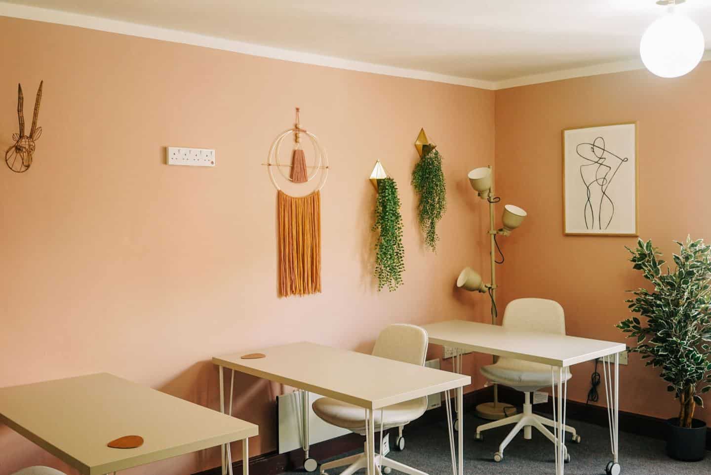 Three desks at The Tribe, a coworking space in Totnes for female entrepreneurs