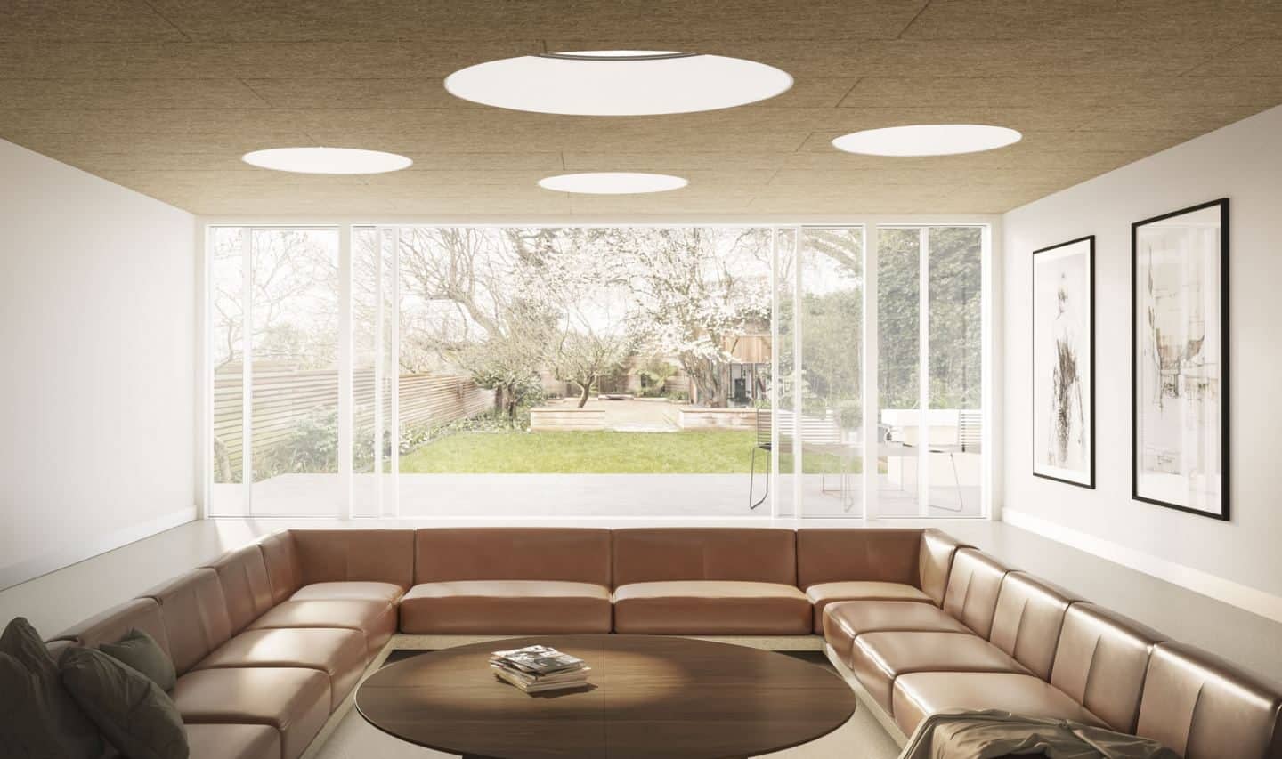 More natural light flows into this sunken dining room from sun tunnels in the ceiling