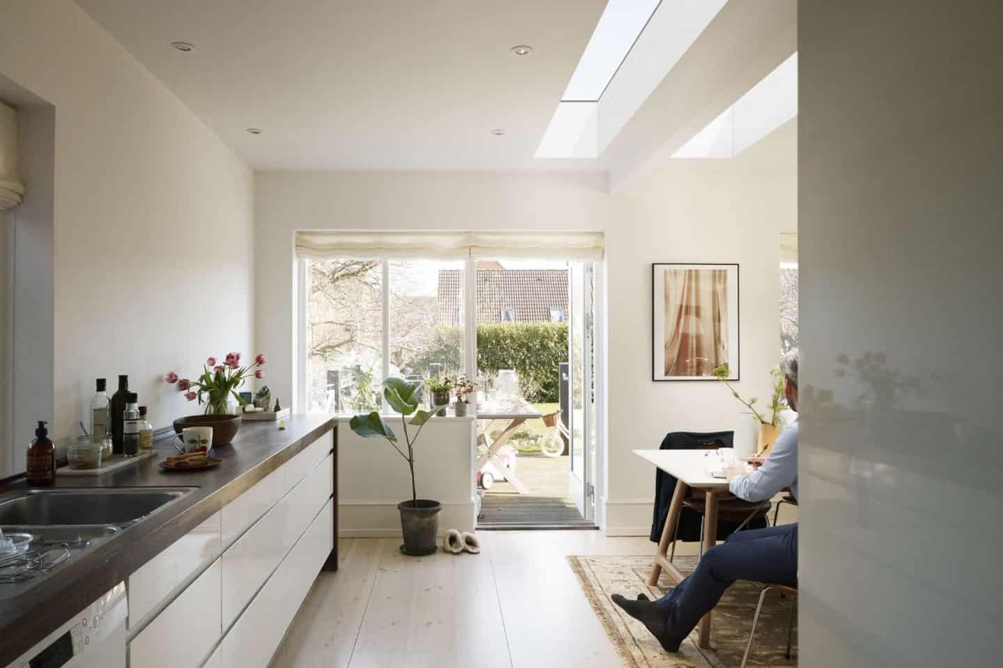 Vario by VELUX Bespoke Flat Roof Windows pictured above an open plan kitchen dining area