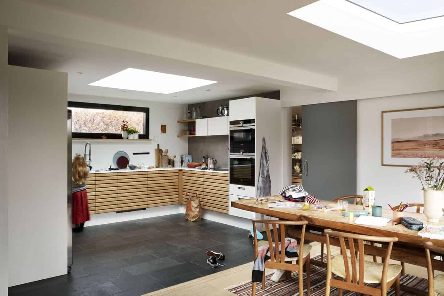 Vario by VELUX Bespoke Flat Roof Windows pictured above an open plan kitchen diner