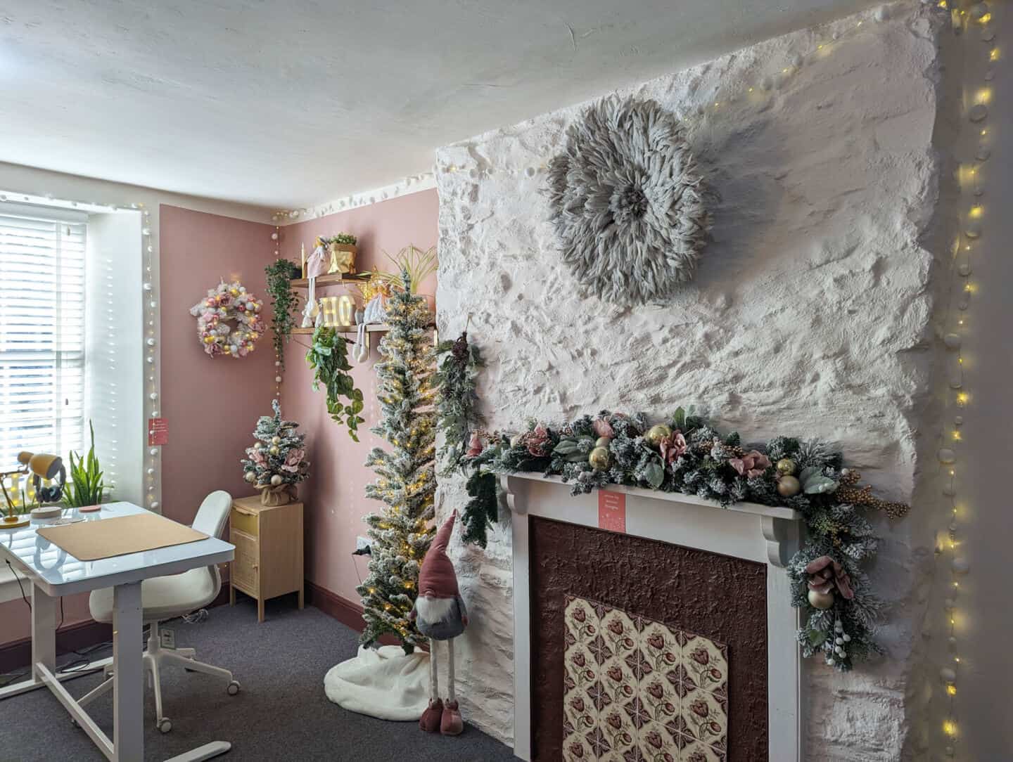 A Pink home office decorated for Christmas