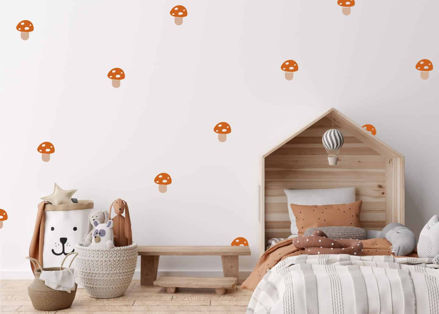 A child's bedroom featuring mushroom wallpaper