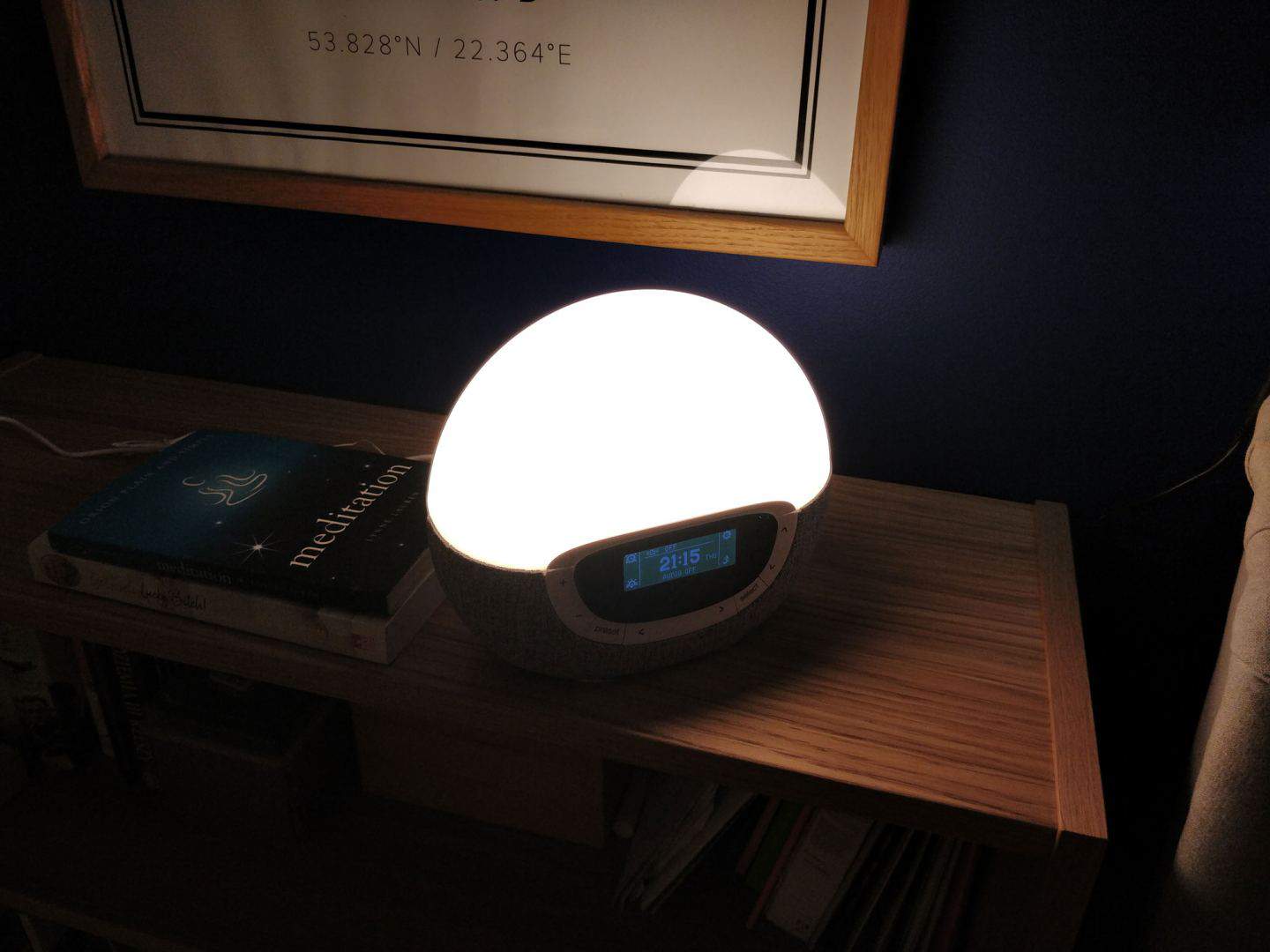 World Sleep Day 2020-5 Ways to Improve your Sleep. A Lumie Wake-up light alarm clock on a shelf