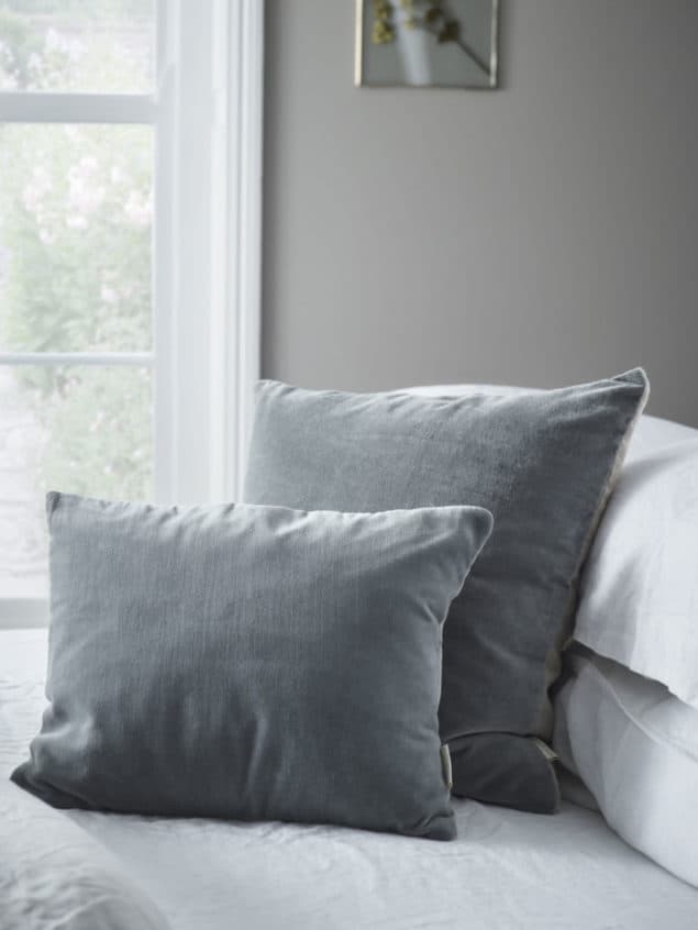 Create a cosy winter home with these grey velvet and linen cushions from Cox & Cox