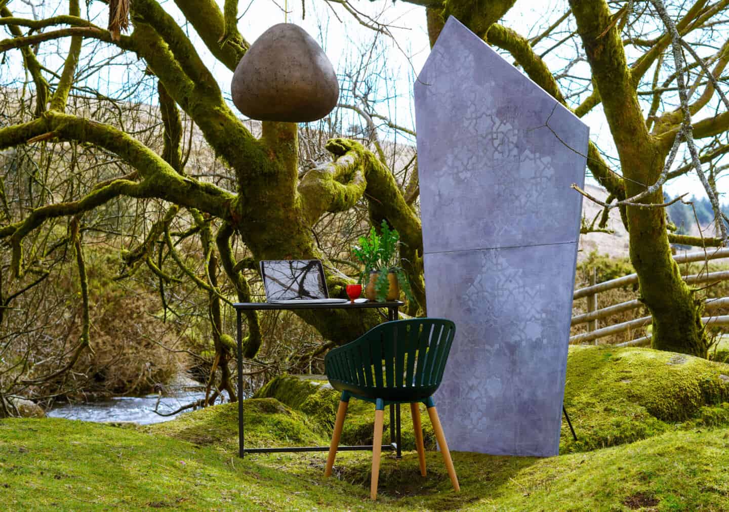 Biophilic home office inspiration. A desk and chair set up outside on Dartmoor.